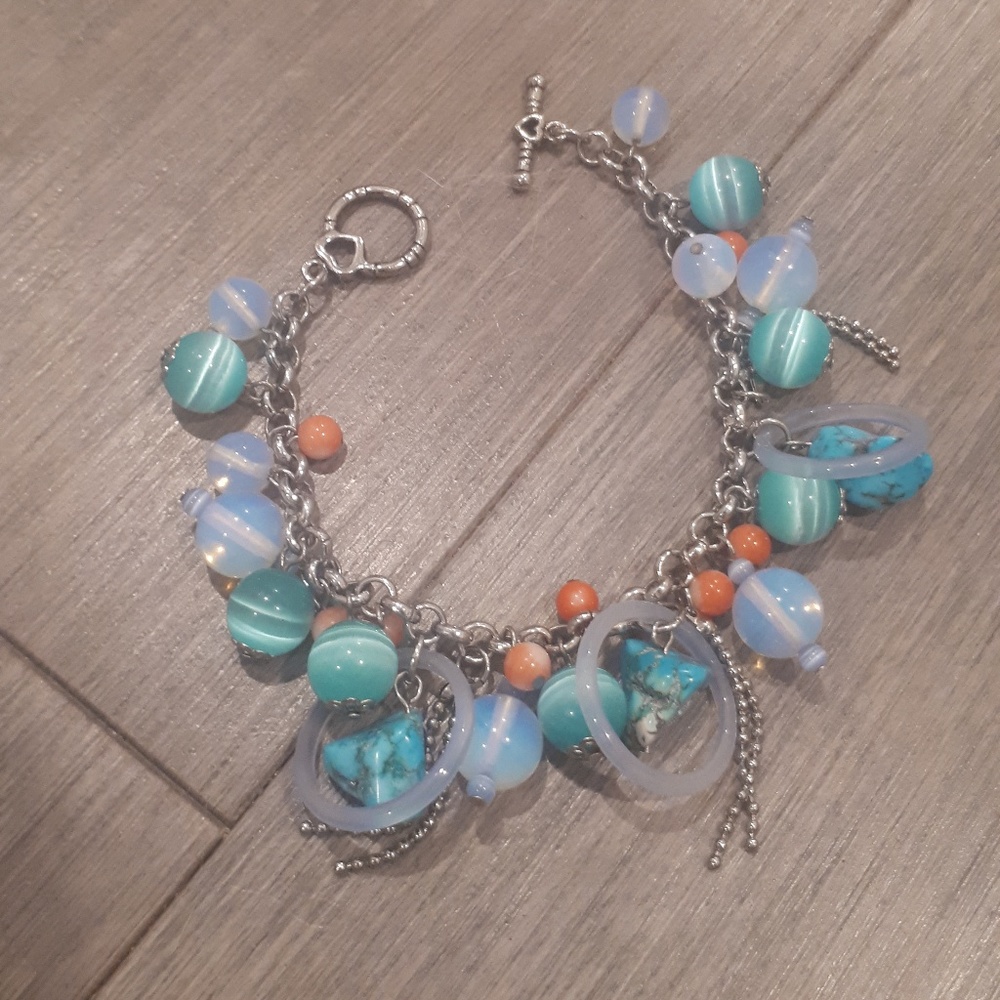 Silver coloured glass turquoise beaded bracelet